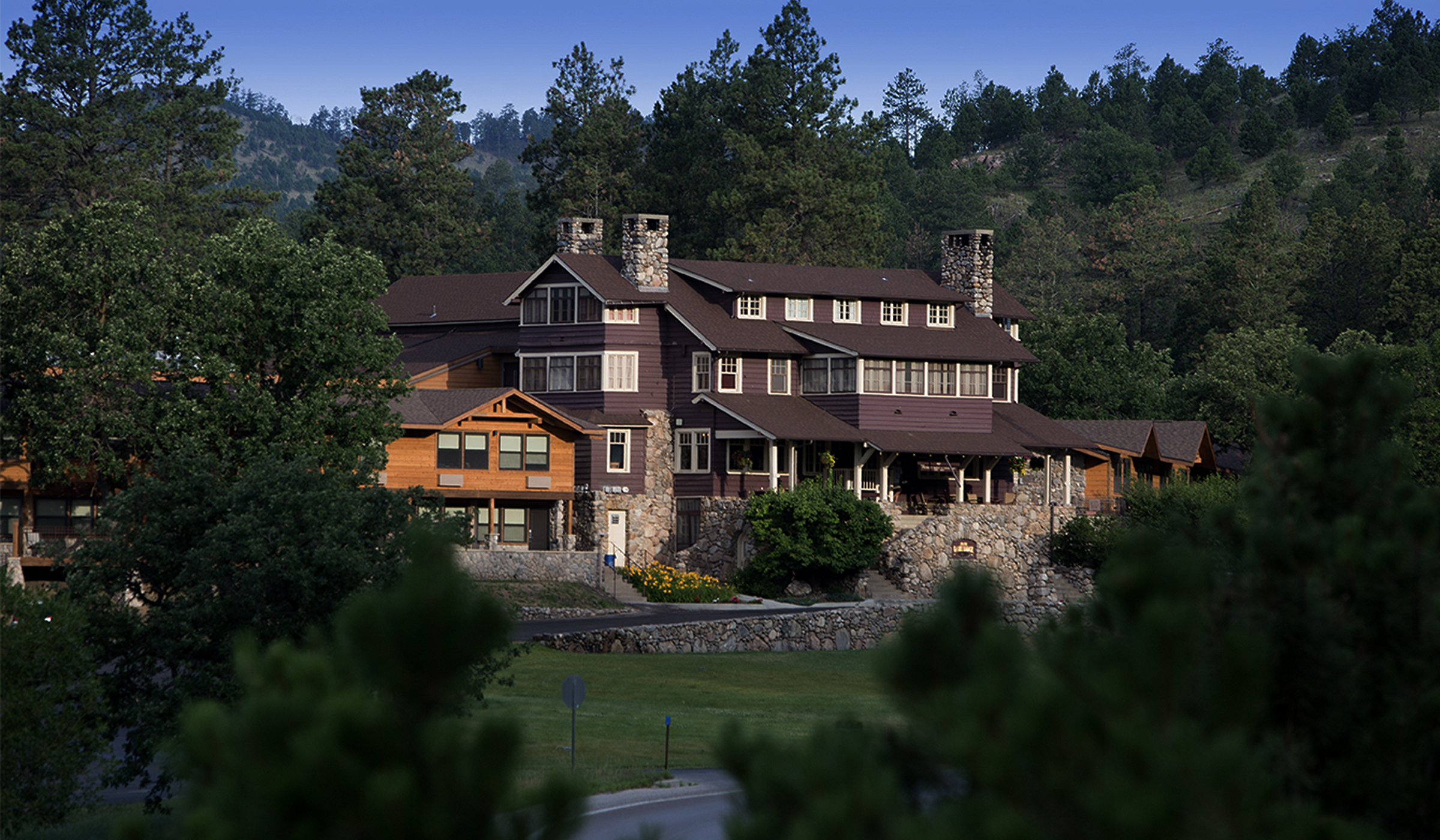 Wide shot of State Game Lodge at Custer State Park Resort