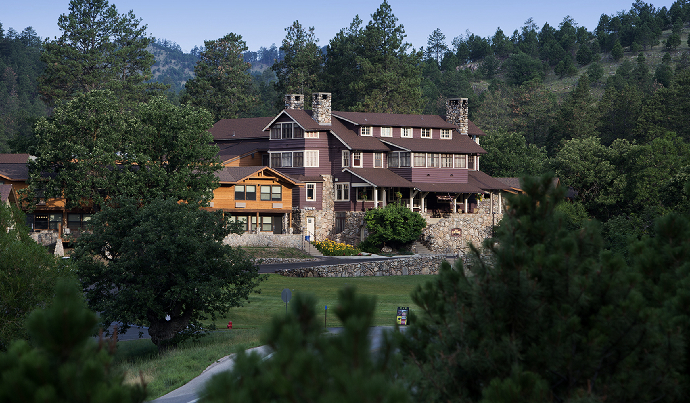 State Game Lodge with trees surrounding