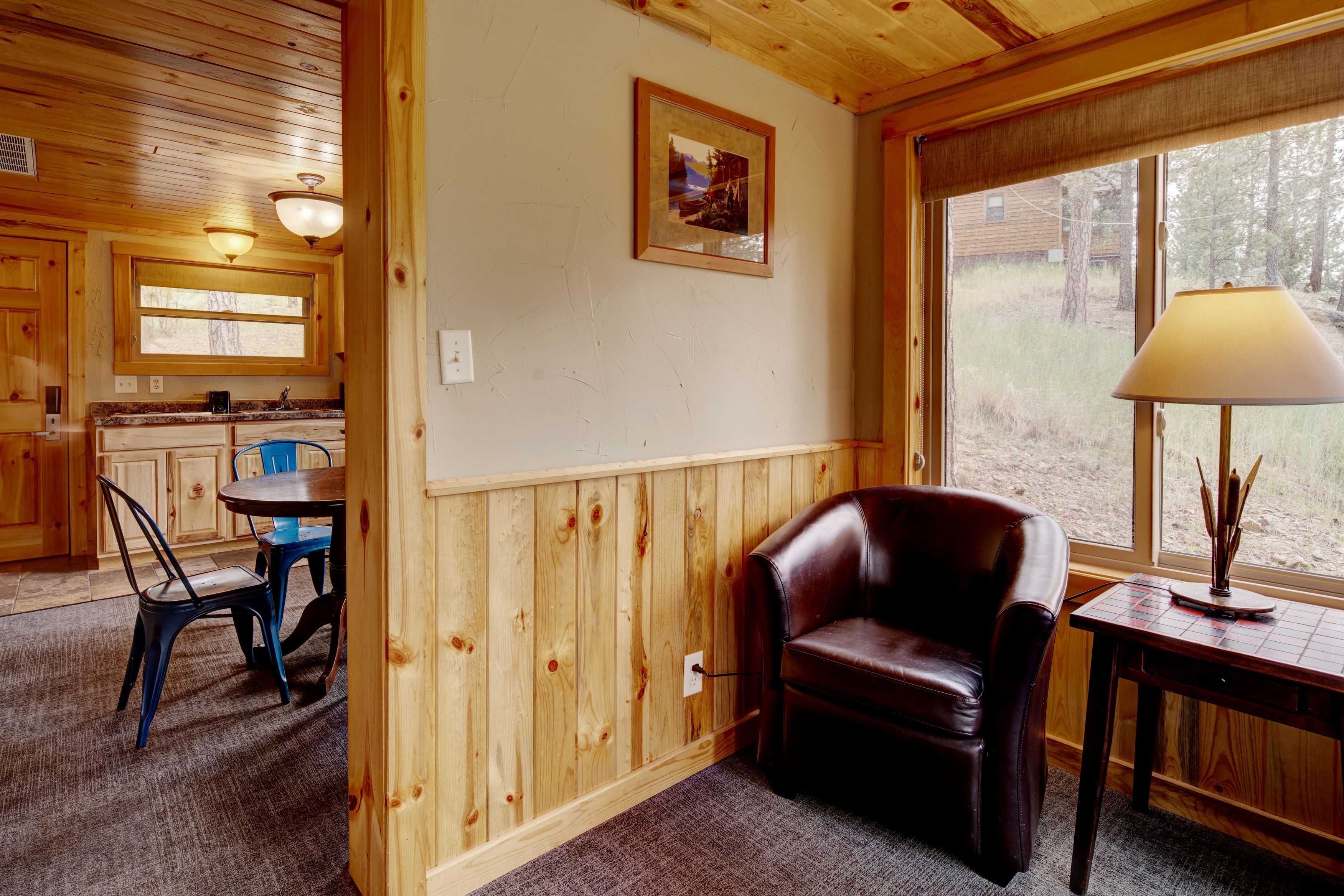 Interior of lodge with dining and living room setup