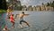 Kids jumping in to Sylvan Lake