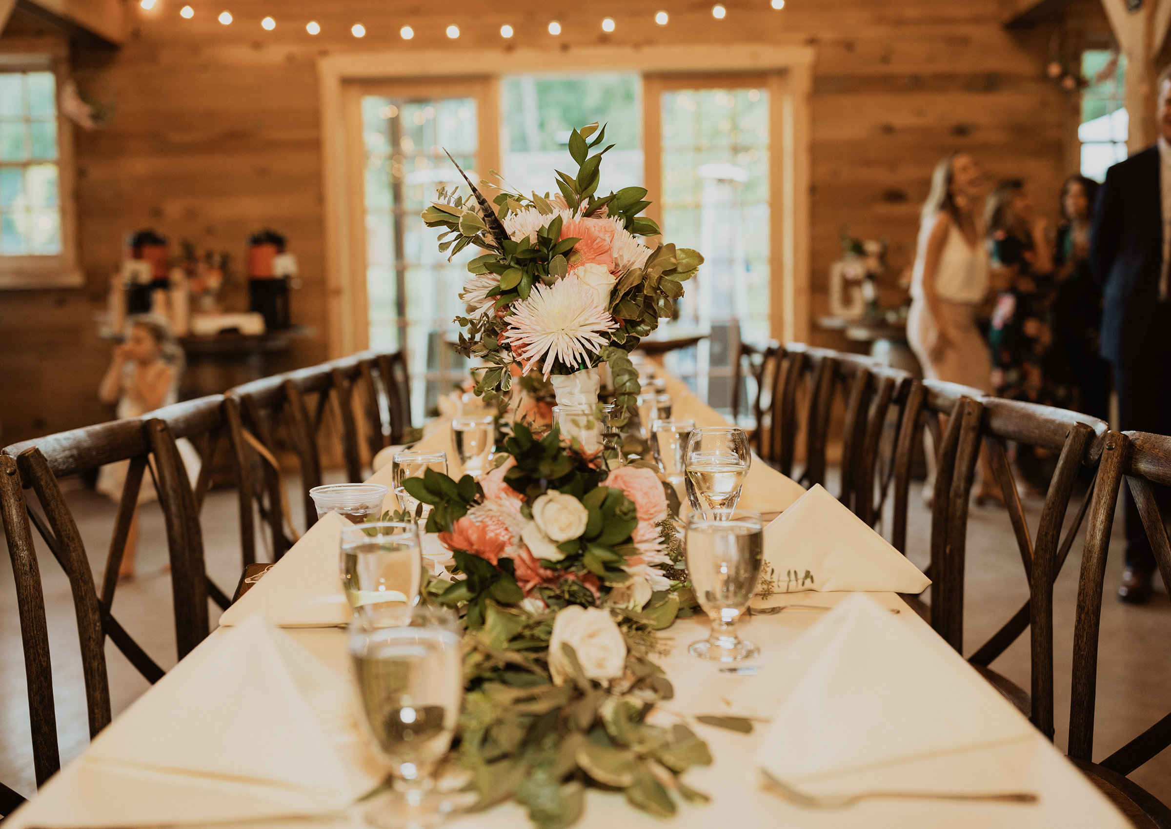 Close-up of a table with flowers on it during a wedding