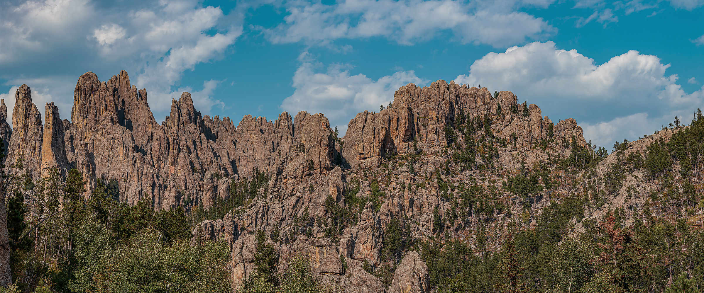 Wide-shot of mountains during the day at Custer