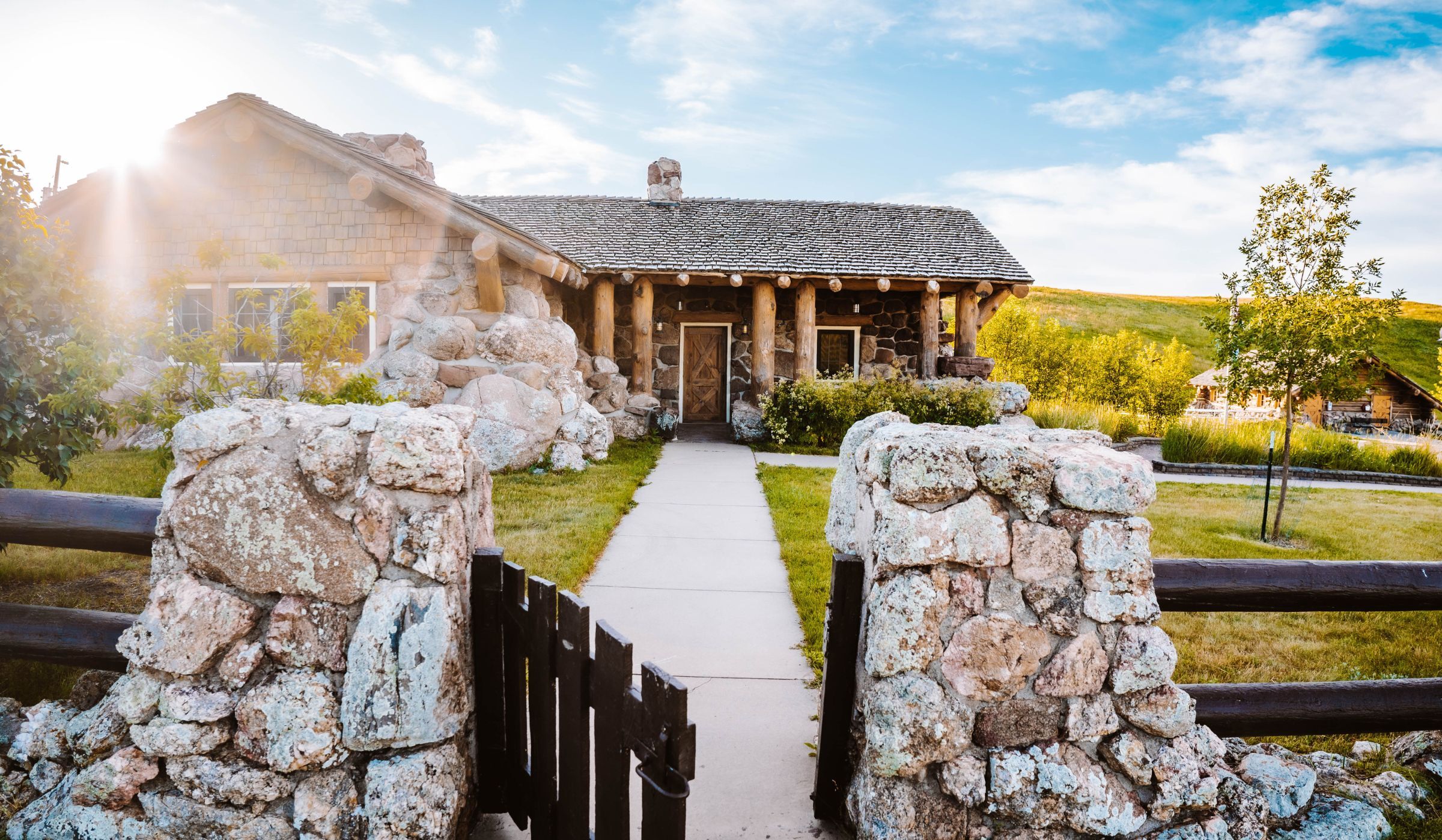 Stone fence and exterior of wildlife station building